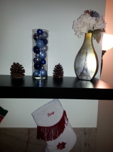 ornaments in vase on mantel